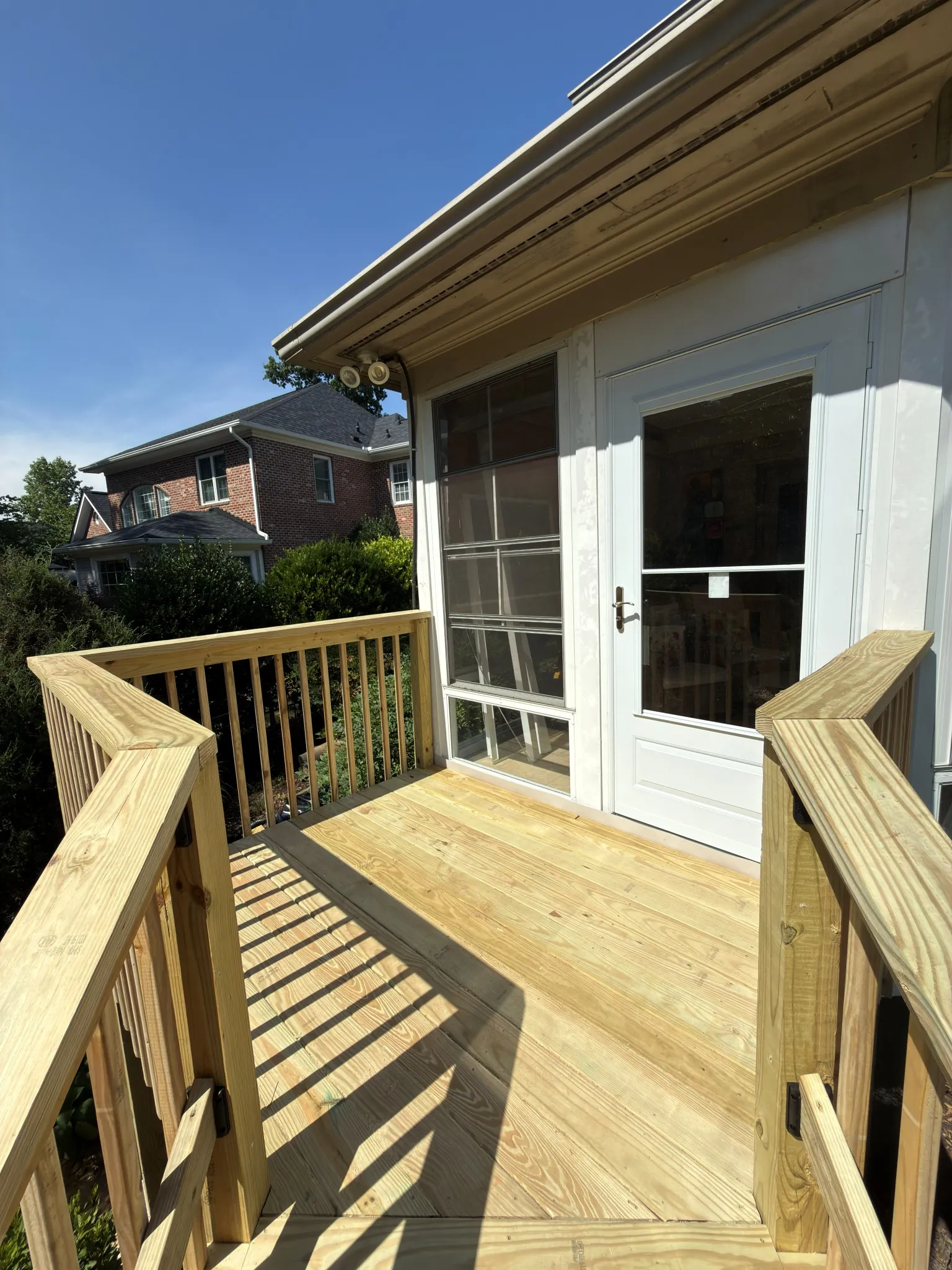 Deck and Porch Construction completed by RK Renovation for a Morrisville, NC homeowner