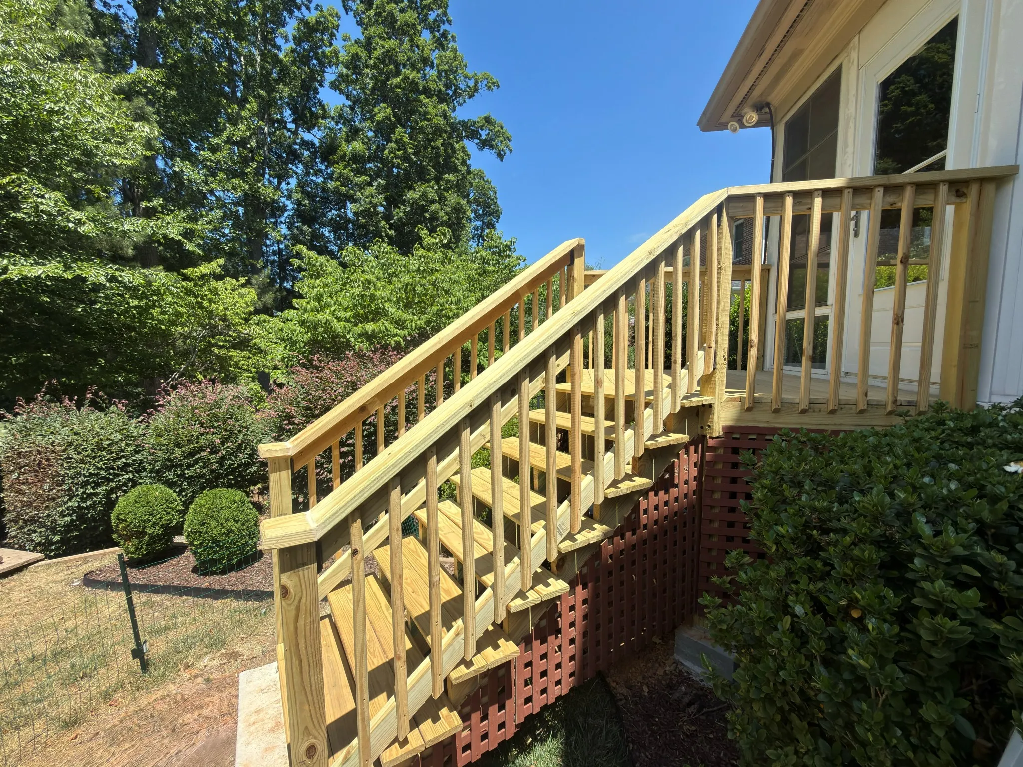 Deck and Porch Construction completed by RK Renovation for a Wake Forest, NC homeowner