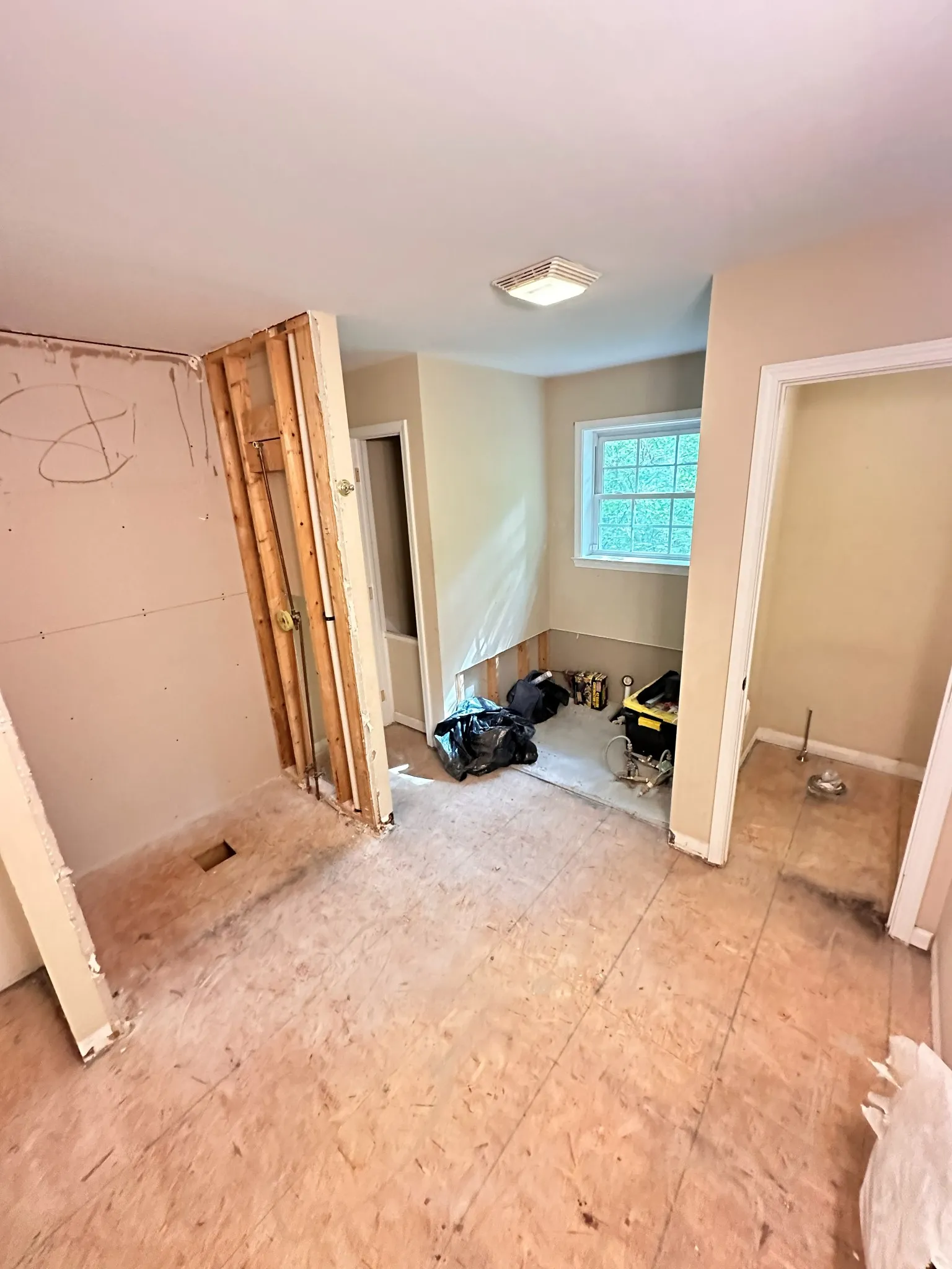 Close detail of water damage restoration on a Holly Springs project