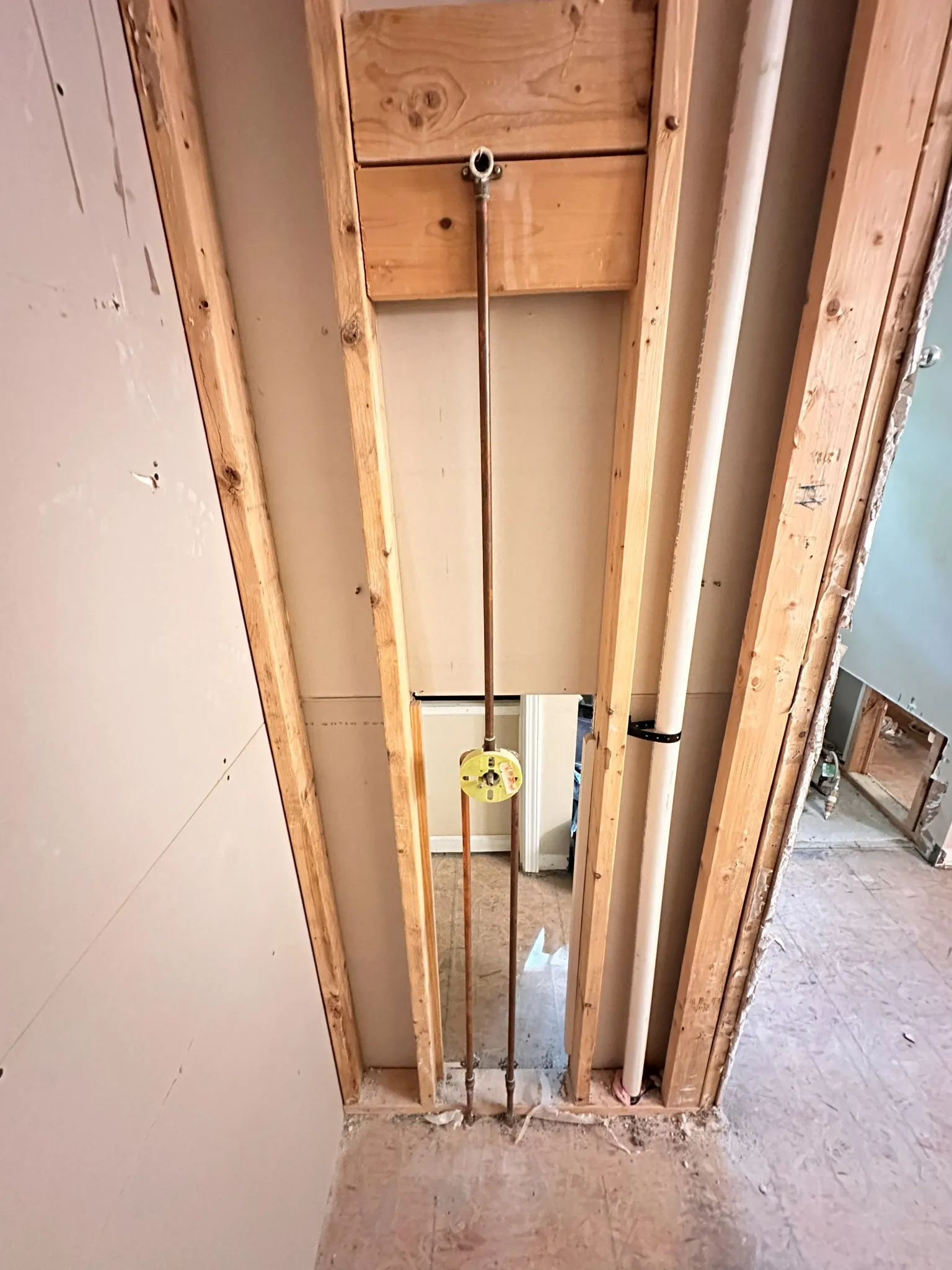 Close detail of water damage restoration on a Raleigh project