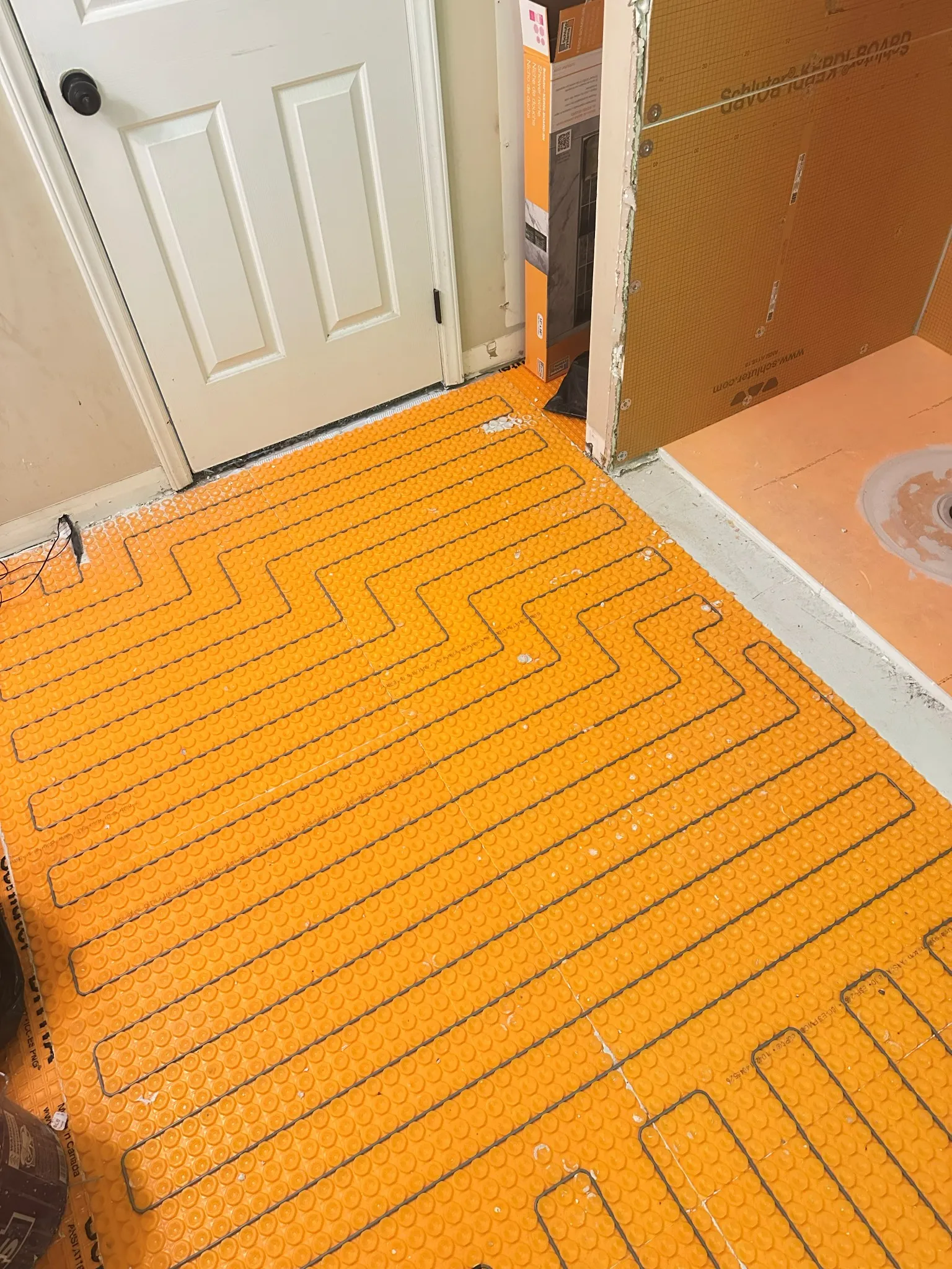 Close detail of flooring installation on a Garner project