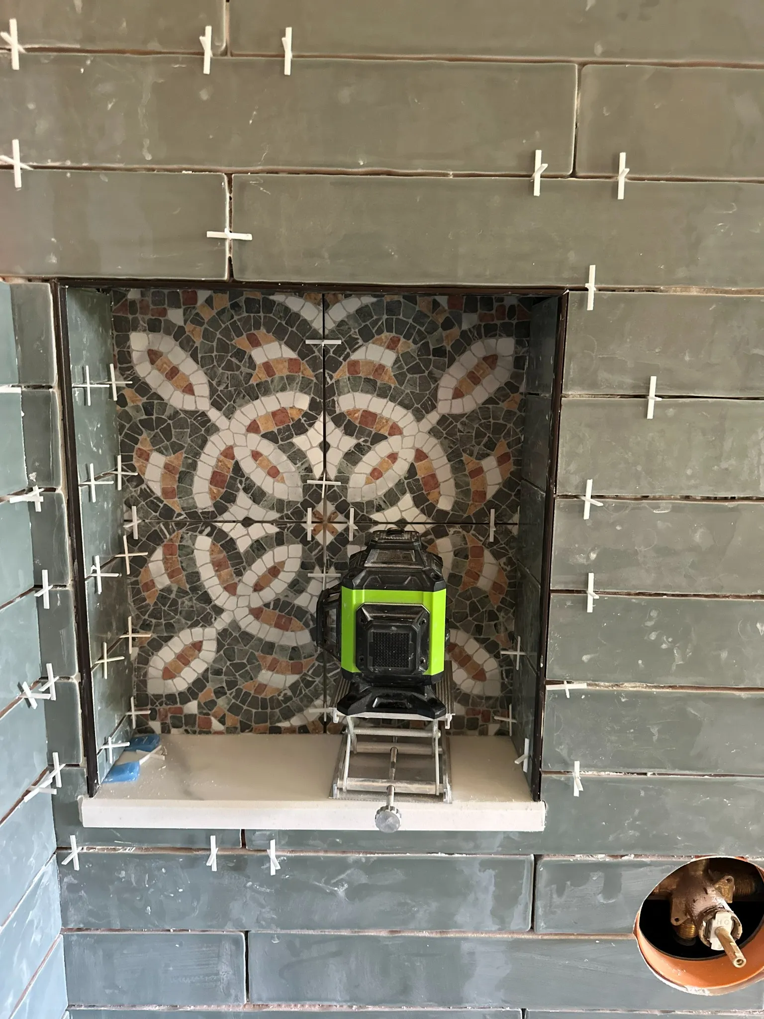 Close detail of tile installation work in progress