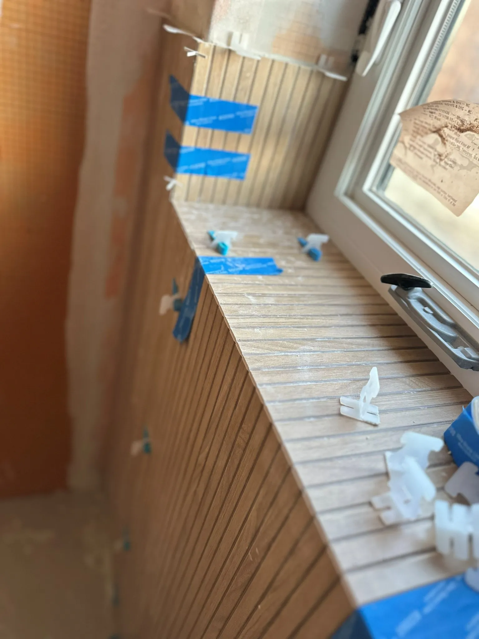 Close detail of tile installation on a Apex project